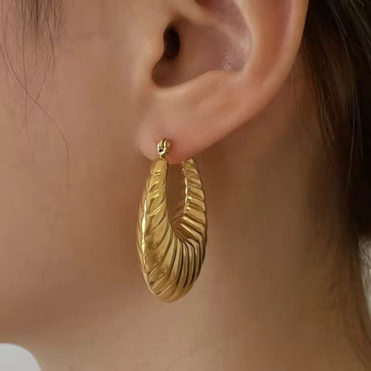 Boucles d'oreilles épaisses, audacieuses et minimalistes