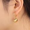 Boucles d'oreilles pendantes rondes en or