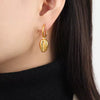 Boucles d'oreilles pendantes en coquillages de petite taille