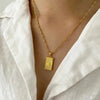 Collier avec pendentif rectangulaire en forme de soleil