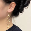 Beautiful Twisting Infinity Gold Earrings