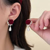 Nouvelle boucle d'oreille en velours rouge vin avec perle rose