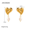 Boucles d'oreilles pendantes avec pendentif en forme de cœur et perle